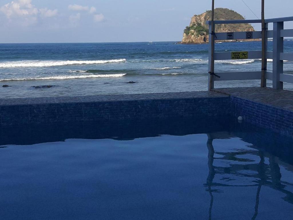Aura Marina Sands Beach Resort Baler Extérieur photo