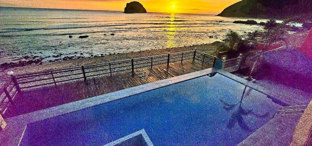 Aura Marina Sands Beach Resort Baler Extérieur photo